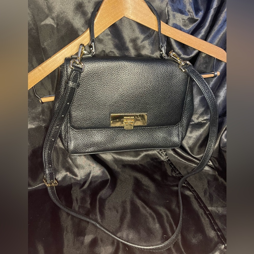Michael Kors black pebble flap crossbody purse with gold hardware